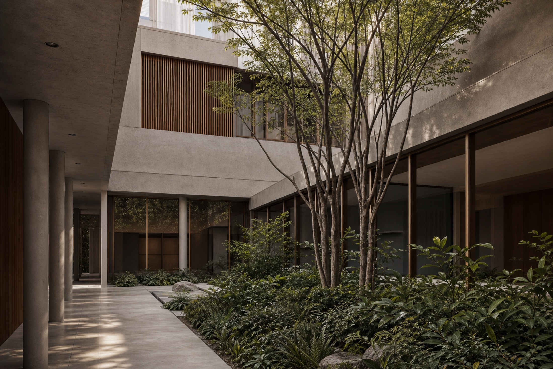 The Courtyard Studio, a calm commercial studio arranged around planted interior light.